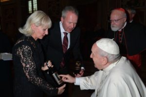 The Pope receiving a gift of wine from Tim and Steph Busch