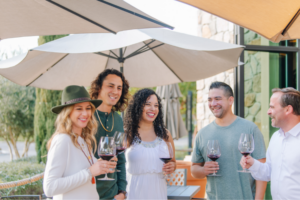 Group of tasters enjoying wine outside of the tasting room