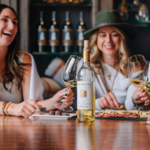 Girls enjoying wine tasting.