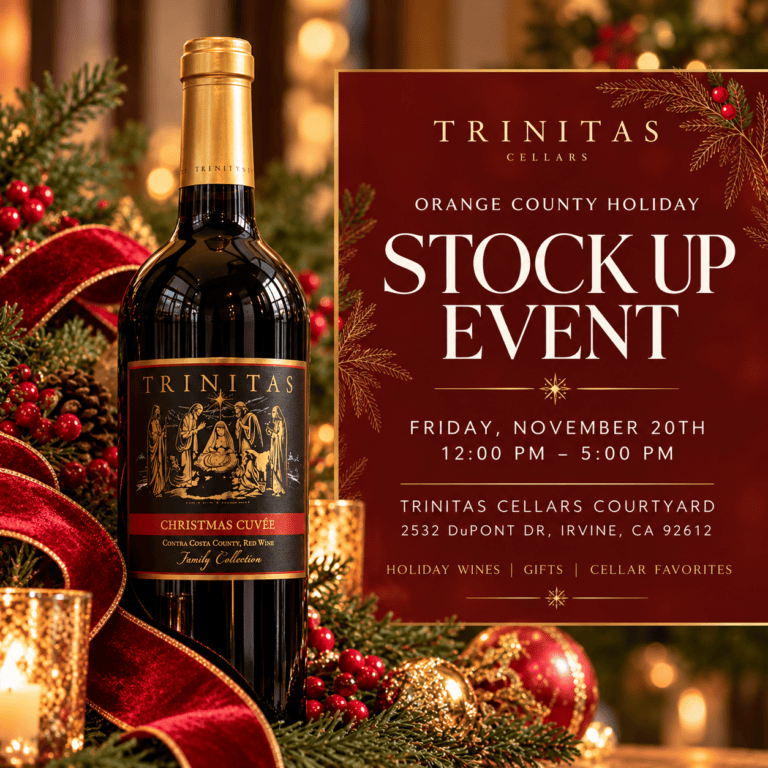 Trinitas Cellars Christmas Cuvée wine bottle surrounded by festive holiday greenery, red ribbons, and gold ornaments, promoting the Orange County Holiday Stock-Up Event on November 20, 2026.
