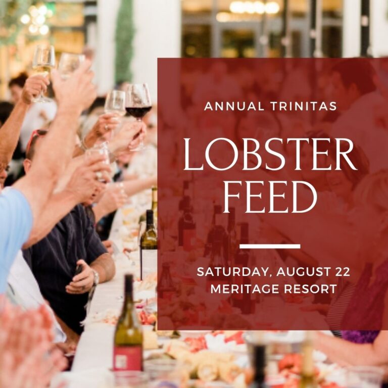 People raise glasses at a long dining table with text promoting an Annual Trinitas Lobster Feed event.